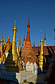 Inle Lake Myanmar. Indein, on the summit of a hill the  Shwe Inn Thein Paya a cluster of hundreds of ancient stupas. Many of them are ruined and overgrown with bushes. 